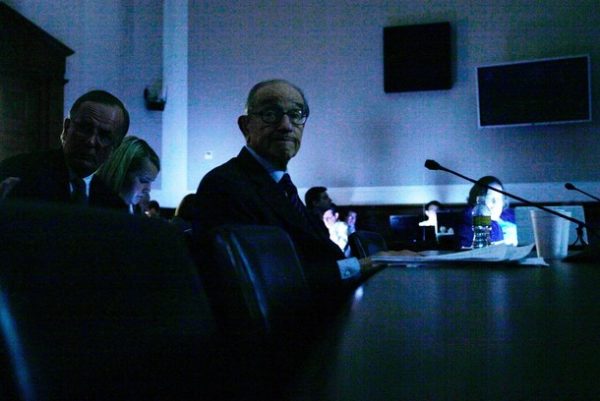 WASHINGTON - APRIL 07: Former Federal Reserve Board Chairman Alan Greenspan waits in the dark as a power outage takes place during a hearing before the Financial Crisis Inquiry Commission April 7, 2010 on Capitol Hill in Washington, DC. The commission began a three-day hearing on "Subprime Lending and Securitization and Government-Sponsored Enterprises" to examine the meltdown of subprime mortgages during the financial crisis in 2008. (Photo by Alex Wong/Getty Images)