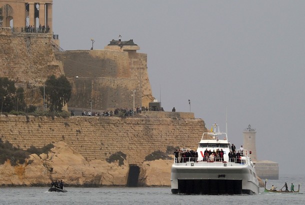 Pope Benedict XVI (C) tours a boat during a trip from Kalkara ferry to the Valletta waterfront on April 18, 2010. Pope Benedict XVI on Sunday expressed his personal "shame and sorrow" to victims of paedophile priests at a surprise meeting during a visit to Malta.    AFP PHOTO / ALBERTO PIZZOLI (Photo credit should read ALBERTO PIZZOLI/AFP/Getty Images)