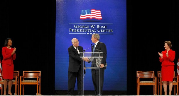 DALLAS - NOVEMBER 16:  Former U.S. Vice President Dick Cheney introduces Former U.S. President George W. Bush as Former Secretary of State Condolezza Rice and Former First Lady Laura Bush look on during the George W. Bush Presidential Center groundbreaking ceremony on November 16, 2010 in Dallas, Texas. The George W. Bush Presidential Center is a state-of-the-art  250 million dollar complex that will include Former U.S. President George W. Bush's presidential library and museum, the George W. Bush Policy Institute, and the offices of the George W. Bush Foundation.  (Photo by Tom Pennington/Getty Images)