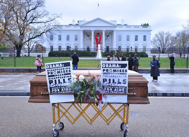 A casket sits in front of  the White House during a mock funeral December 1, 2010 in Washington, DC. The activists were calling for the Obama administration to more to fight the disease on World AIDS Day.  AFP PHOTO/Karen BLEIER (Photo credit should read KAREN BLEIER/AFP/Getty Images)