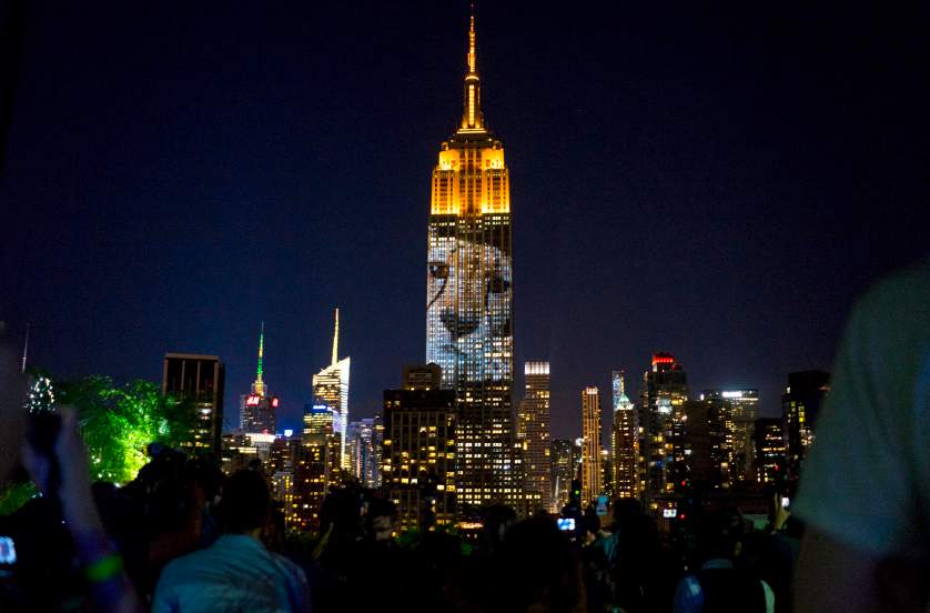 Large images of endangered species are projected on the south facade of The Empire State Building, Saturday, Aug. 1, 2015, in New York. The large scale projections are in part inspired by and produced by the filmmakers of an upcoming documentary called "Racing Extinction."  (AP Photo/Craig Ruttle)