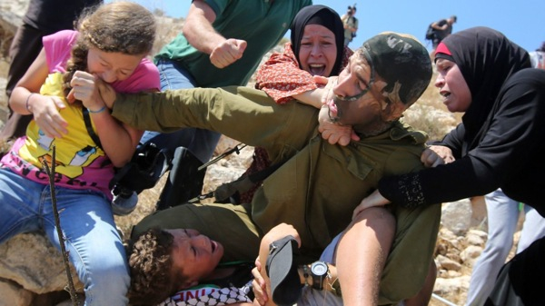 Why We Saw the Photo of the Israeli Solder Giving the Palestinian Boy a Headlock … Not Fighting a Girl