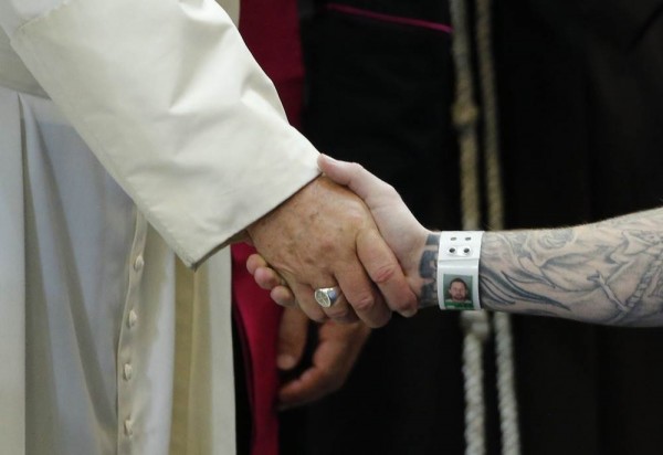 On that Photo of the Pope and a Prisoner Holding Hands in Philadelphia