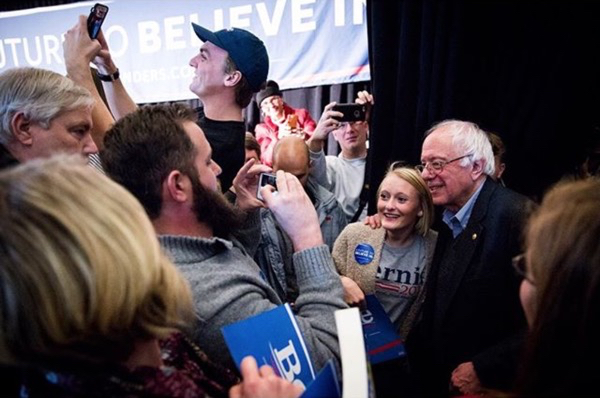 Instagram imagery via Max Whittaker. Democratic presidential candidate Sen. Bernie Sanders poses for photos with supporters after a rally in Ankeny, Iowa Sunday night.