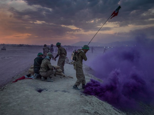 A battalion of members of the Iranian paramilitary Baseej force participate in a reenactment of the Iran-Iraq (1980-1988) war in the South of Tehran.