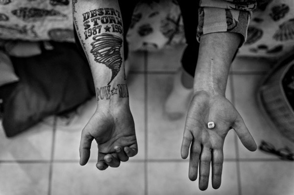 Connie Sue Foss was raped three times during her seven-year military career and has found it difficult to hold down a job to care for herself and her daughter. She bears scars from punching a window during a PTSD episode and holds a molar she lost from grinding her teeth at night.