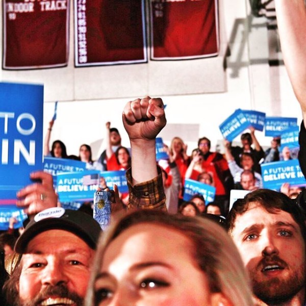 People cheer for Bernie Sanders at his Primary Night party in New Hampshire.