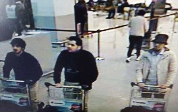 A young man in a hat caught on CCTV pushing a luggage trolley at Belgium's Zaventem airport alongside two others who, investigators said, had later blown themselves up in the terminal. REUTERS/Belgian Federal Police