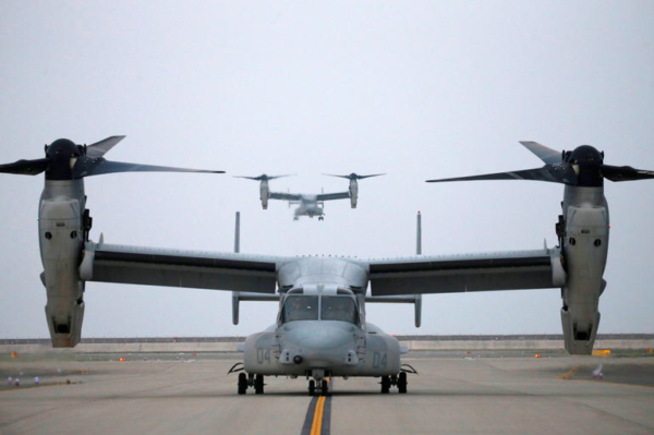 U.S. MV-22 Osprey aircrafts carrying U.S. delegates and press members are seen at an airfield near Hiroshima Peace Memorial Park and Museum after U.S. President Barack Obama visited the park in Hiroshima, Japan, May 27, 2016. Photo by Carlos Barria/Reuters