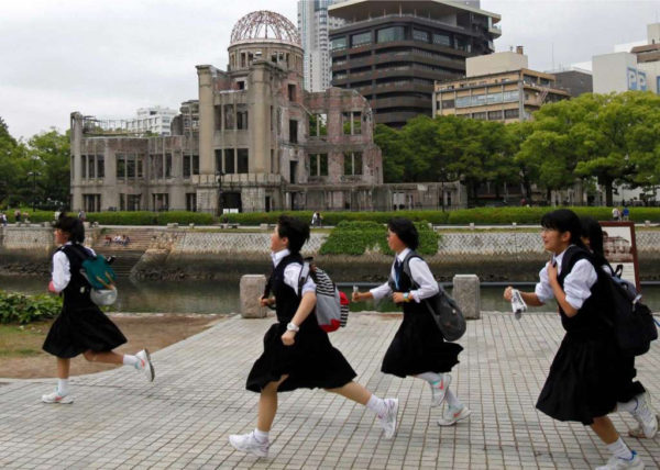 Photo: Shuji Kajiyama, AP Schoolgirls run past the Atomic Bomb Dome at the Hiroshima Peace Memorial Park in Hiroshima, southwestern Japan, Thursday, May 26, 2016. U.S. President Barack Obama is to visit Hiroshima on Friday, May 27 after the Group of Seven summit in central Japan, becoming the first serving American president to do so.