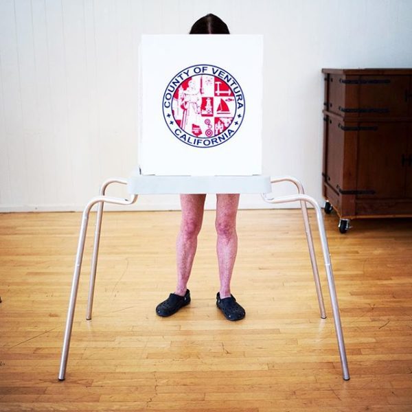 A person at a voting booth in Ojai, California casting a ballot in the 2016 presidential primary.