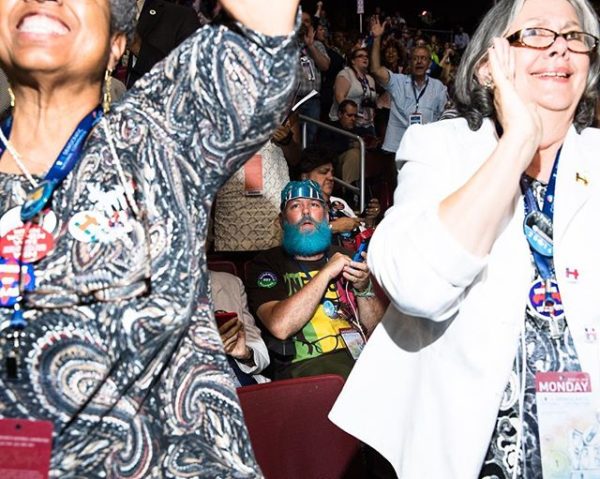 Bernie supporter (center) does not cheer alongside Hillary supporters yesterday during opening speeches. Brett Carlsen @gettyimages