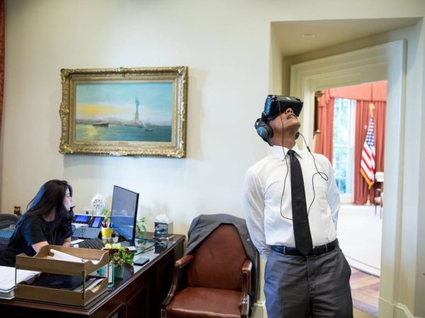 photo: Pete Souza. caption: President Obama watches a virtual reality film captured during his trip to Yosemite National Park earlier this year. 