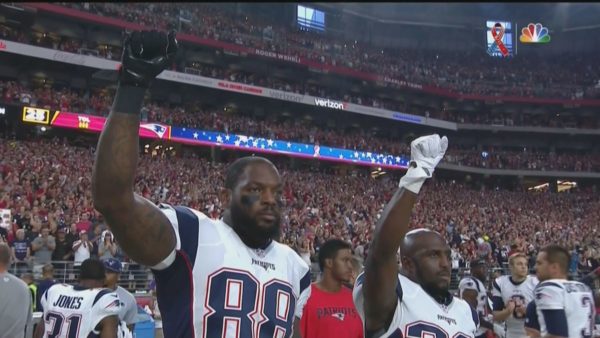 Prior to Sunday Night Football, Patriots tight end Martellus Bennett and safety Devin McCourty also raised their fists after the national anthem. photo via SBNation.