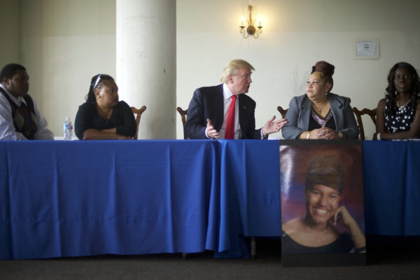 Mr. Trump on Friday at the Greater Exodus Baptist Church in Philadelphia with Shalga Hightower, 55, whose daughter Iofemi Hightower was killed in 2007. Mark Makela for The New York Times