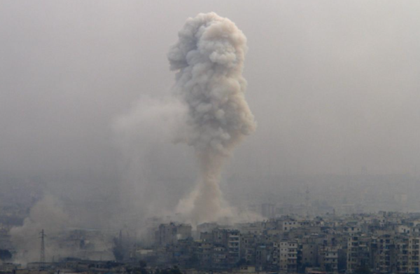 Smoke rises after air strikes on rebel-controlled besieged eastern Aleppo, Syria December 5, 2016.