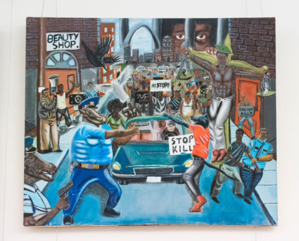 The controversial painting of community-police relations in Ferguson, Mo., by former St. Louis high school student David Pulphus depicts police officers as animals. (Bill Clark/CQ Roll Call)