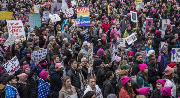 Demonstrators protest during the Women's March on January 21, 2017 in Washington, DC. .Hundreds of thousands of people flooded US cities Saturday in a day of women's rights protests to mark President Donald Trump's first full day in office. / AFP / Joshua LOTT
