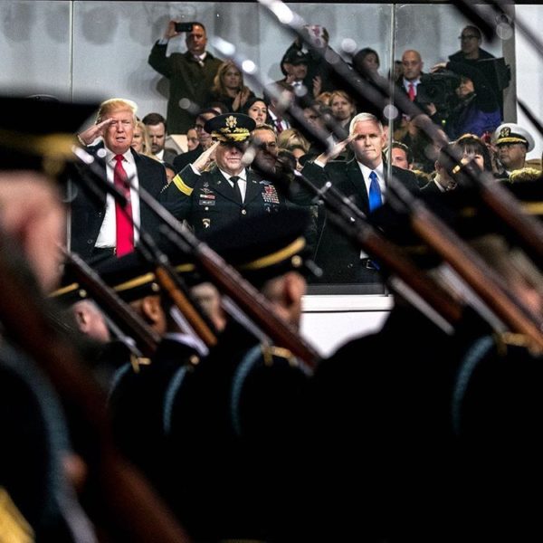 President Trump saluting members of the military in the inaugural parade. Credit Sam Hodgson for The New York Times