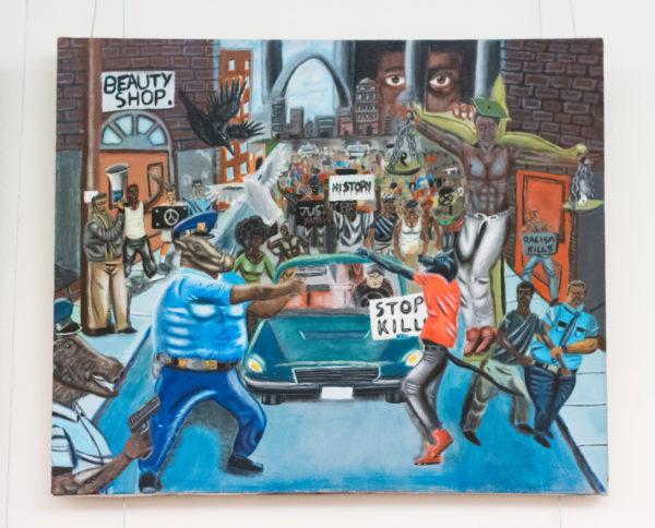 The controversial painting of community-police relations in Ferguson, Mo., by former St. Louis high school student David Pulphus depicts police officers as animals. (Bill Clark/CQ Roll Call)