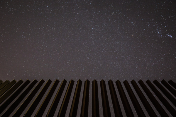 Tamir Kalifa for The New York Times, “A starry sky on a clear night in January near Harlingen, Tex., where a border wall already exists.” 