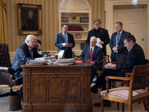 Drew Angerer/Getty Images Caption: President Donald Trump speaks on the phone with Russian President Vladimir Putin in the Oval Office of the White House, January 28, 2017 in Washington, DC. Also pictured, from left, White House Chief of Staff Reince Priebus, Vice President Mike Pence, White House Chief Strategist Steve Bannon, Press Secretary Sean Spicer and National Security Advisor Michael Flynn. On Saturday, President Trump is making several phone calls with world leaders from Japan, Germany, Russia, France and Australia. 