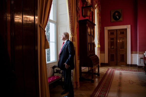 Post the traditional inaugural tea and coffee reception, President-elect Donald Trump looks out of the Red Room window onto the South Portico of the White House grounds on Friday, Jan. 20, 2017, prior to departing the White House for the Presidential Inaugural ceremony. (Official White House Photo by Shealah Craighead)