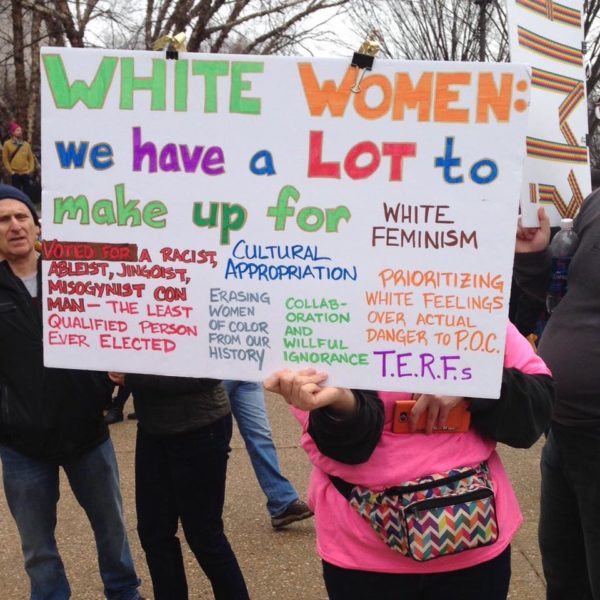 Sign reading: White Women: we have a lot to make up for. Women's March on Washington. 1/21/17. Photo: Ellie Hall‏