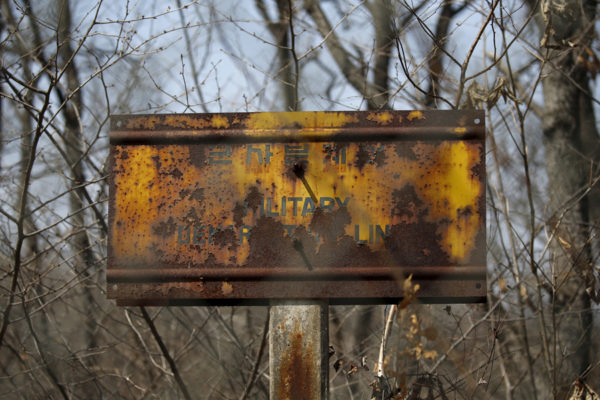 A rusty sign that reads "military demarcation line" is seen at the Neutral Nations Supervisory Commissions headquarters near the truce village of Panmunjom, South Korea, on March 30, 2016. # Kim Hong-Ji / Reuters
