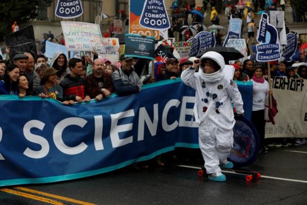 Demonstrators march to the U.S. Capitol during the March for Science in Washington, April 22, 2017. REUTERS/Aaron P. Bernstein
