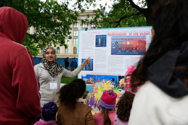 Kulsoom Ghias, a high school student, presented her science club’s project on ocean acidification at the march in Oklahoma City. Credit: Nick Oxford for The New York Times