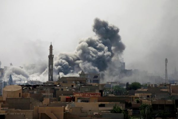 Smoke rises from an airstrike during a battle between Iraqi forces and Islamic State militants in western Mosul. REUTERS/Alaa Al-Marjani