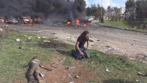 Abd Alkader Habak cries on the ground. Photo: Muhammad Alrageb