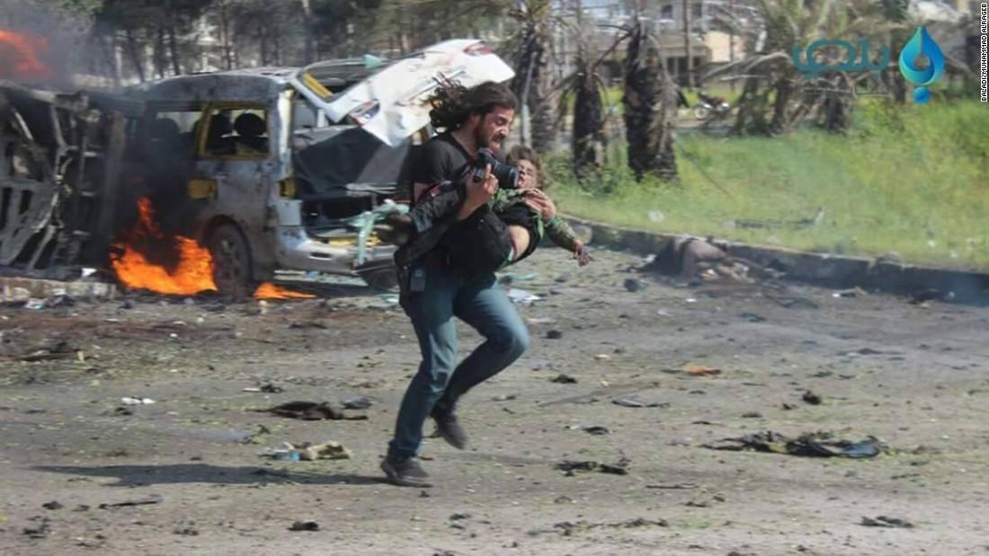 After briefly being knocked unconscious by the blast activist and journalist Abd Alkader Habak put aside his camera to help those wounded. Photo: Aleppo Media Centre