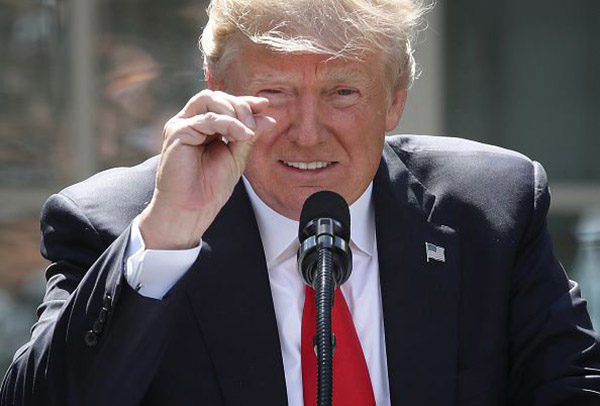 WASHINGTON, DC - JUNE 01: U.S. President Donald Trump announces his decision for the United States to pull out of the Paris climate agreement in the Rose Garden at the White House June 1, 2017 in Washington, DC. Trump pledged on the campaign trail to withdraw from the accord, which former President Barack Obama and the leaders of 194 other countries signed in 2015. The agreement is intended to encourage the reduction of greenhouse gas emissions in an effort to limit global warming to a manageable level. (Photo by Win McNamee/Getty Images)
