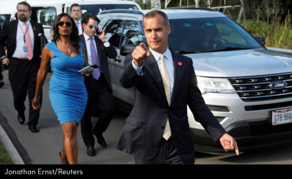 Former campaign manager Corey Lewandowski (C) says hello to reporters as he and White House advisors Sebastian Gorka (from L), Omarosa Manigault and Communications Director Anthony Scaramucci accompany President Trump for an event celebrating veterans at AMVETS Post 44 in Struthers, Ohio, U.S. July 25, 2017. Photo: Jonathan Ernst/REUTERS