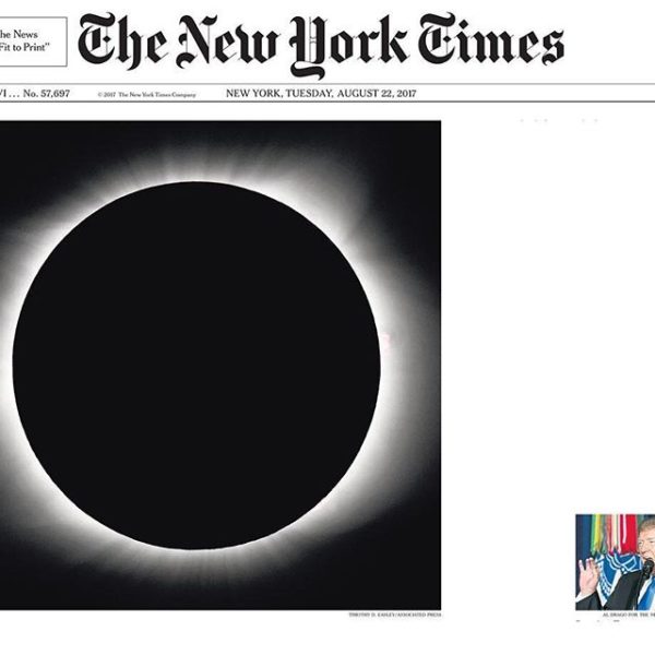 Instagram photo by Lorie Novak. A rendering of the NY Times front page relating a photo of the solar eclipse to a photo of President Trump.