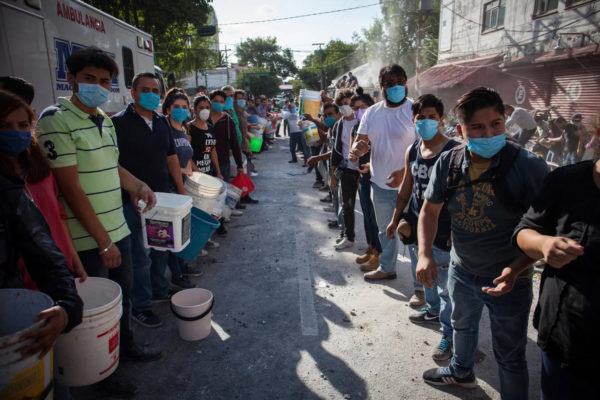  Photo: Latincontent / Getty Images Caption: Rescuers and residents look for victims amid the ruins of a building knocked down by a magnitude-7.1 earthquake that jolted central Mexico on Tuesday.