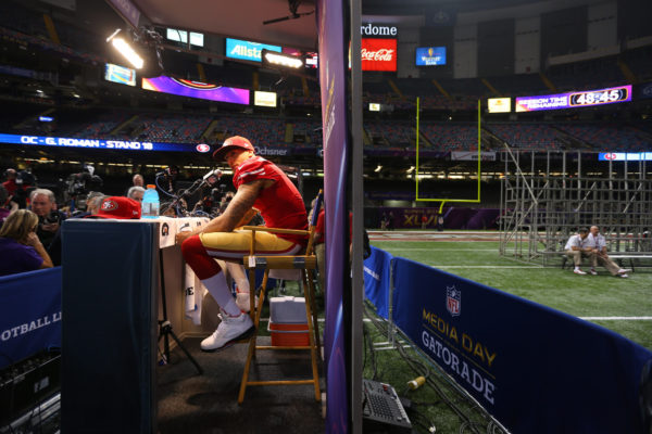 Kaepernick during media day ahead of his Super Bowl appearance. He eventually became very reluctant to say much in interviews. CHANG W. LEE / THE NEW YORK TIMES