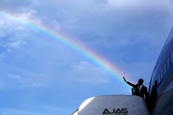 April 9, 2015 "The President's wave aligns with a rainbow as he boards Air Force One at Norman Manley International Airport prior to departure from Kingston, Jamaica.. (Official White House Photo by Pete Souza)