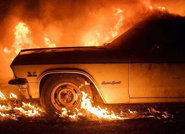 The Wall wildfire consumes a vintage Chevy yesterday. Noah Berger/Special to The Chronicle