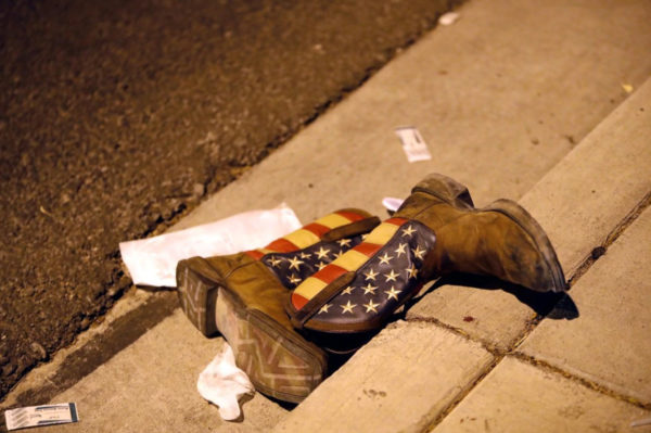 Oct. 1, 2017 A pair of cowboy boots is shown in the street outside the concert venue. Steve Marcus/Reuters/Las Vegas Sun