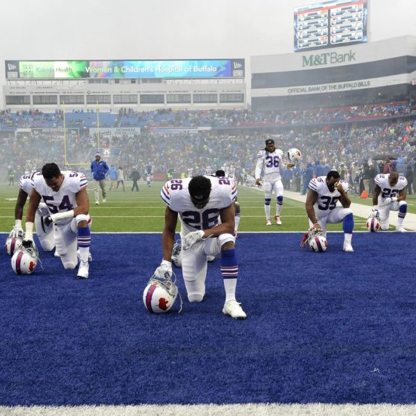 Buffalo Bills players take a moment to themselves prior to an NFL game against the Oakland Raiders in Orchard Park, N.J., on Oct. 29, 2017. Photograph by Adrian Knaus—@ap.images/REX/@shutterstock