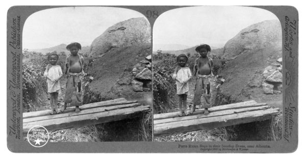 Museum of the Old Colony/Pablo Delano. Caption: “Porto Rican Boys in their Sunday Dress, near Aibonita.” Sourced from Stereo card by Strohmeyer and Wyman, New York, N.Y., sold by Underwood & Underwood, 1900.