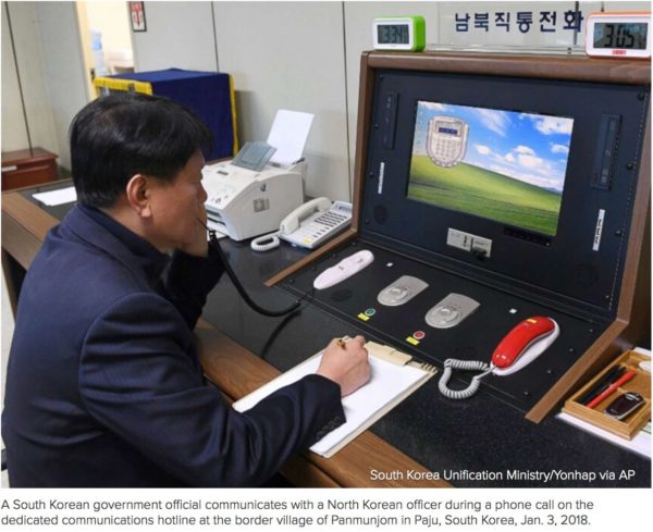 A South Korean government official communicates with a North Korean officer during a phone call on the dedicated communications hotline at the border village of Panmunjom in Paju, South Korea, Jan. 3, 2018. Photo: South Korean Unification Ministry/Yohap via AP