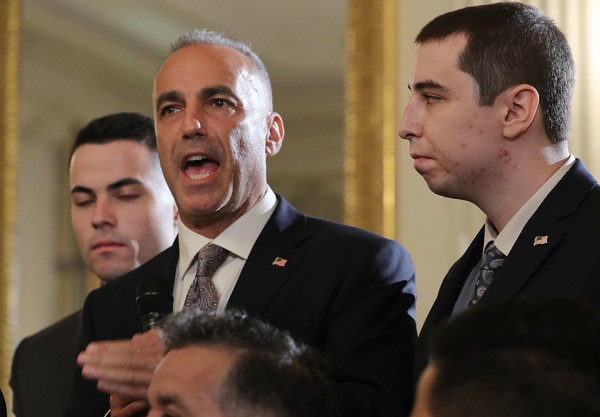 Andrew Pollack (C), whose daughter Meadow Pollack was shot to death last week at Marjory Stoneman Douglas High School, is joined by his sons as he addresses a listening session with U.S. President Donald Trump in the State Dining Room at the White House February 21, 2018 in Washington, DC. Trump hosted the session about school safety in the wake of last week's mass shooting at Marjory Stoneman Douglas High School in Parkland, Florida, that left 17 students and teachers dead. (Feb. 20, 2018 - Source: Chip Somodevilla/Getty Images North America)