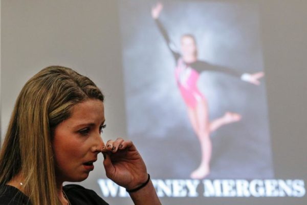 Victim and former gymnast Whitney Mergens: "He believed he could relieve some back pain. With my mother in the room, he managed to slip his cold bare hands up my shorts and slid his fingers into the most personal area of my body. As he pushed I was in much discomfort. It felt like it would last forever. When it was over my 11-year-old innocent mind was oblivious to what had just happened. I knew it hurt, but he was the Olympic doctor, so I thought it must have helped." REUTERS/Brendan McDermid