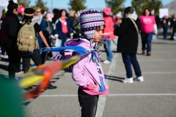 Photo 6: Chona Kasinger/W Magazine. Caption: Participants at the Women's March "Power to the Polls" event on Sunday, January 21st at Sam Boyd Stadium in Las Vegas, Nevada.