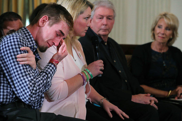 Marjory Stoneman Douglas High School senior Samuel Zeif (L) weeps after talking about how his best friend was killed during last week's mass shooting while he participates in a listening session hosted by U.S. President Donald Trump in the State Dining Room at the White House February 21, 2018 in Washington, DC. Trump is hosting the session in the wake of last week's mass shooting at Douglas High School in Parkland, Florida, that left 17 students and teachers dead. (Feb. 20, 2018 - Source: Chip Somodevilla/Getty Images