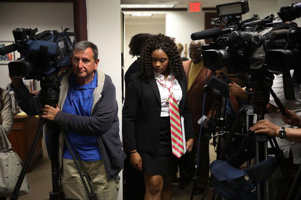 Photos: Joe Raedle/Getty Images. Caption 1: Marjory Stoneman Douglas High School mass shooting survivor Mei-Ling Ho-Shing,17, arrives to speak to the me gun safety roundtable discussion on March 5, 2018 in Sunrise, Florida. Rep. Debbie Wasserman Schultz (D-FL) held the roundtable discussion in response to the shooting at the high school that killed 17 people on February 14.